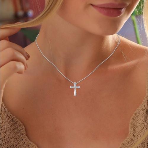 0.16CT. T.W. DIAMOND CROSS HEART PENDANT IN 10KT GOLD
