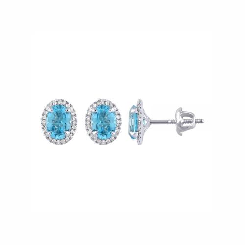 Luxurious Diamond Blue Topaz Halo Stud Earrings in 10KT Gold (3.00 CT. and 0.20 CT. T.W.)