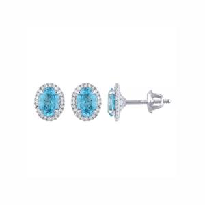 Luxurious Diamond Blue Topaz Halo Stud Earrings in 10KT Gold (3.00 CT. and 0.20 CT. T.W.)